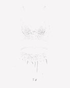 White sheer lace bralette and ruffled skirt panty set with no underwire
