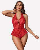 Red lace halter teddy bodysuit with crisscross front lacing and short peplum hem.