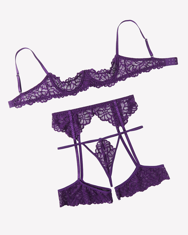 Purple lace lingerie set pieces: lace bra, garter belt, suspender briefs and garters
