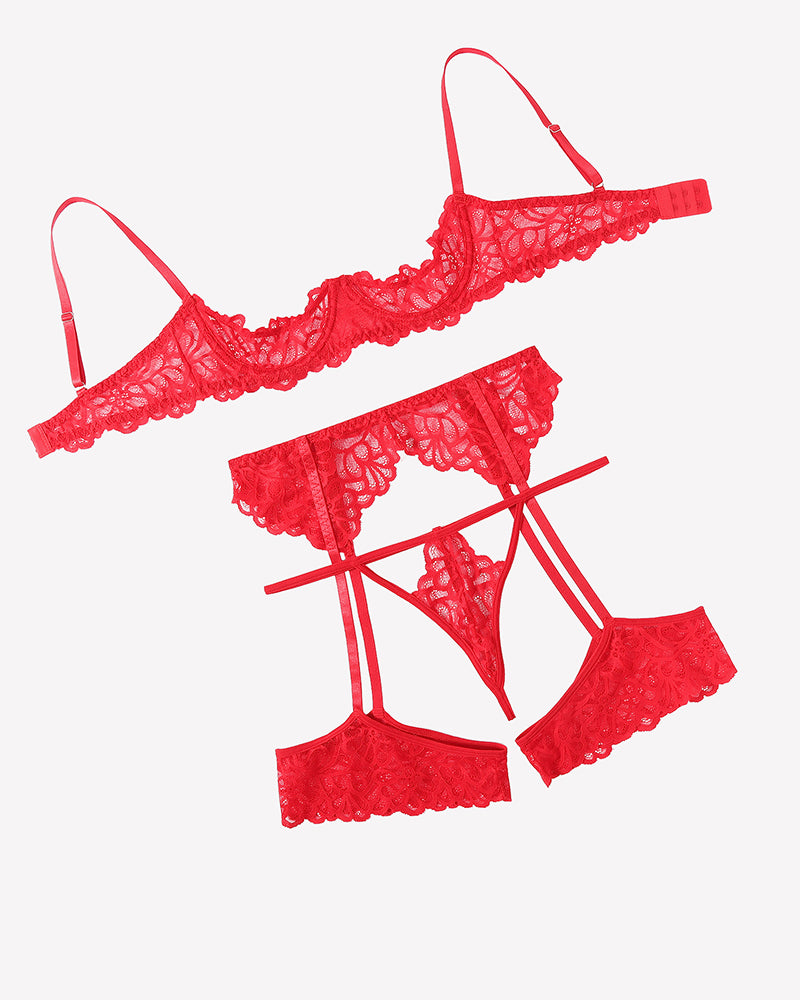 Red lace lingerie set pieces: strappy bra, garter belt, and thong