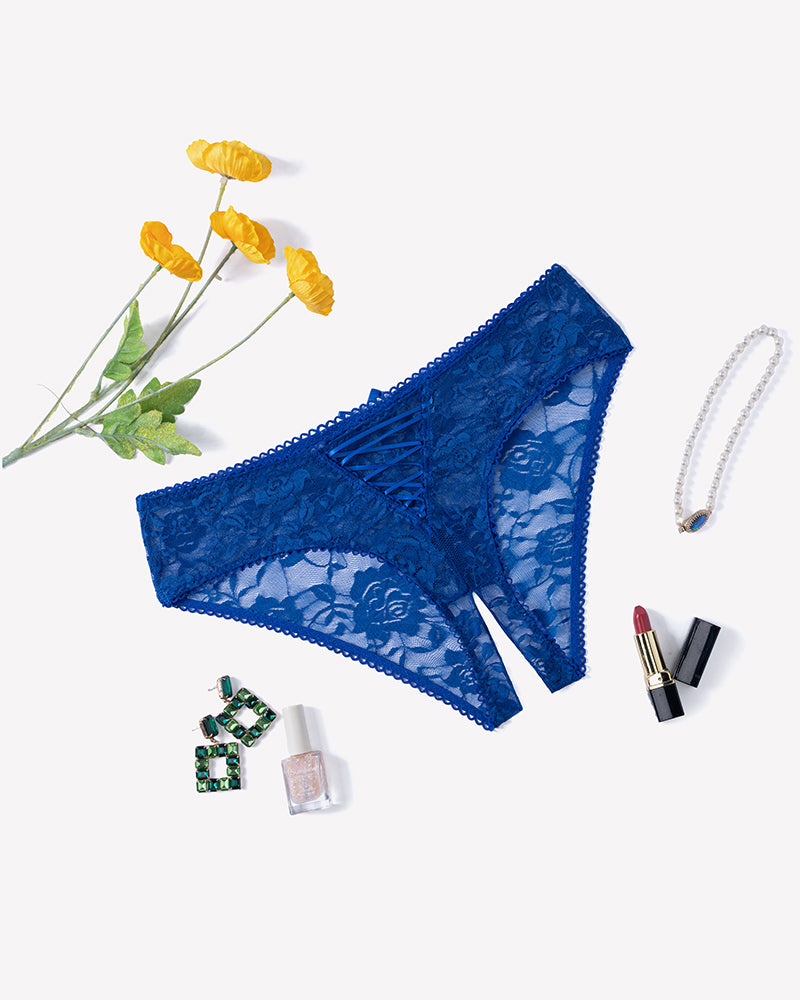 Floral lace boyshort panties with hollow-out style in blue, flat lay view.