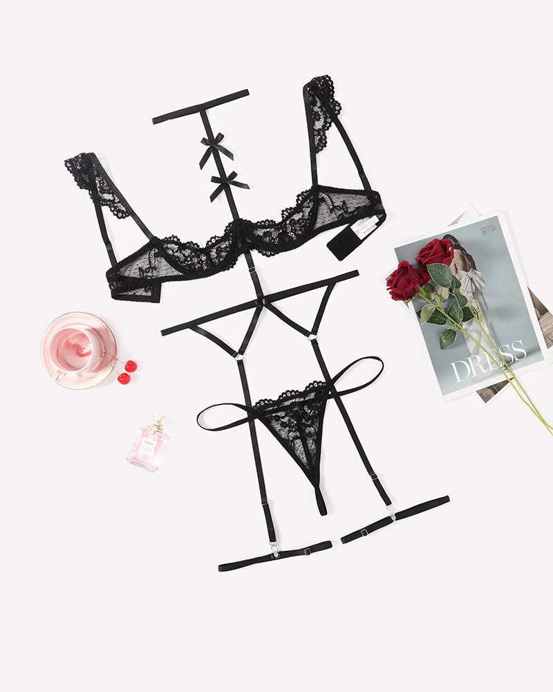 Black lace garter lingerie set with bra, choker, and thong-style bottoms