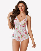 Floral cami romper with V-neck lace trim and fitted waist, white floral print