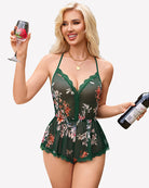 Green floral cami romper with lace V-neck and adjustable straps