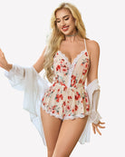 Floral cami romper with lace trim and adjustable thin straps, light floral print