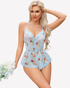 Light blue floral cami romper with lace V-neck and scalloped trim