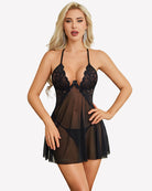 Black lace babydoll dress front view with scalloped lace cups and sheer flared skirt