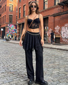 Black tiered mesh mini skirt with draped lace ruffle layers