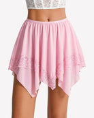 Light pink sheer tiered mini skirt with lace trim and asymmetric layered hem