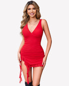 Ruched bodycon mini dress with deep V neck, side slit, and ruffled hem in red