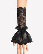 Black lace fingerless gloves with satin bow and scalloped ruffle cuff