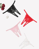 Set of lace thong panties in red, pink, and white with floral pattern, low-rise cut.