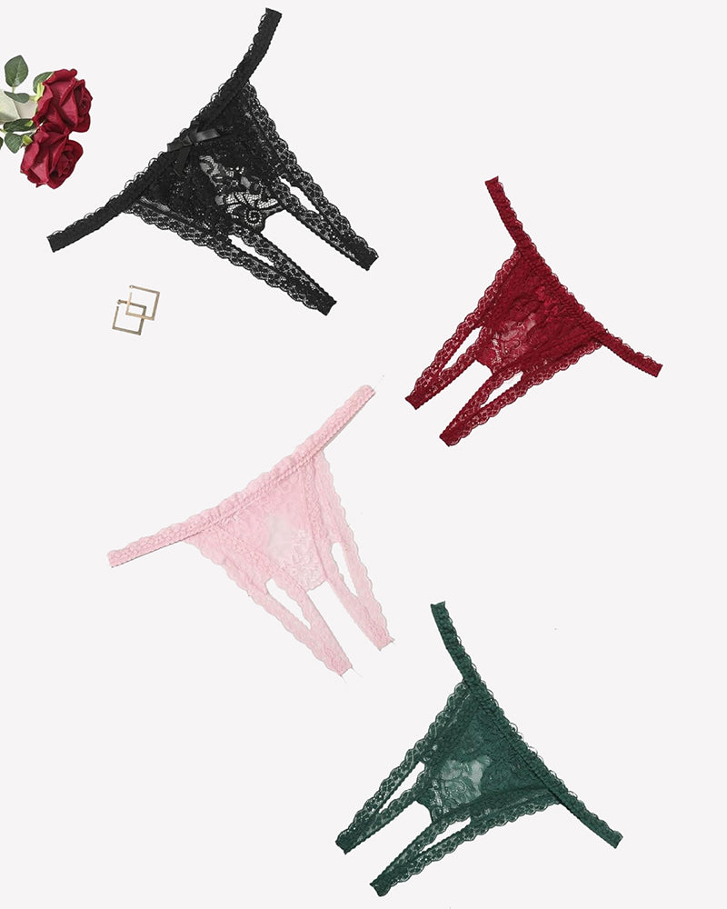 Set of lace thong panties in black, red, pink, and green with floral detailing.