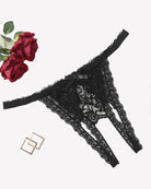 Black lace thong panties with floral pattern, low-rise cut and scalloped sides.
