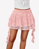 Pink lace pleated mini skort with tiered ruffle hem and hanging side ties