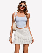 White lace mini skirt with layered ruffle hem, high waist A-line