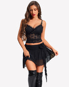 Black tulle mini skirt with ruched waistband, layered ruffles, and side drape ties