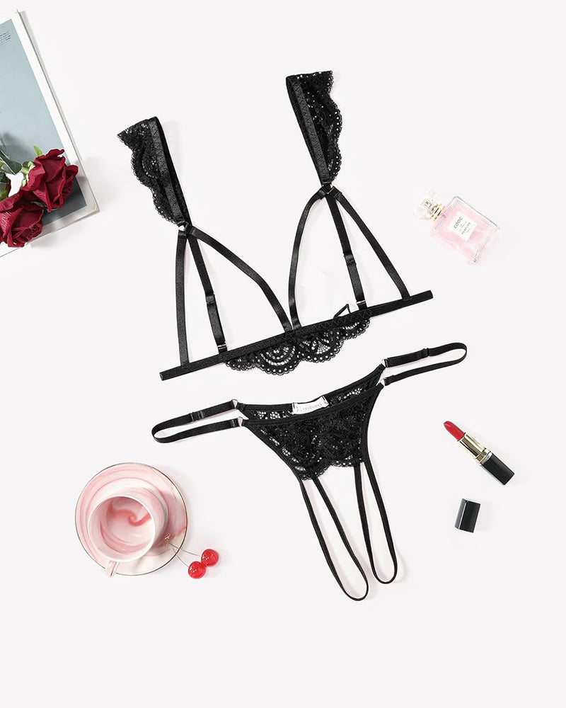Black lace bra and strappy thong set with triangular cups and scalloped lace edge.
