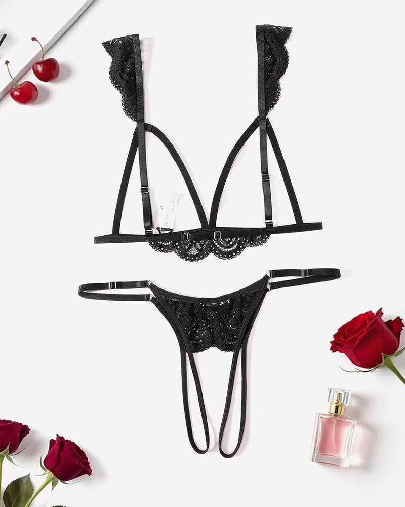 Black lace cutout bra and thong set with scalloped lace edge and multiple strap ties.