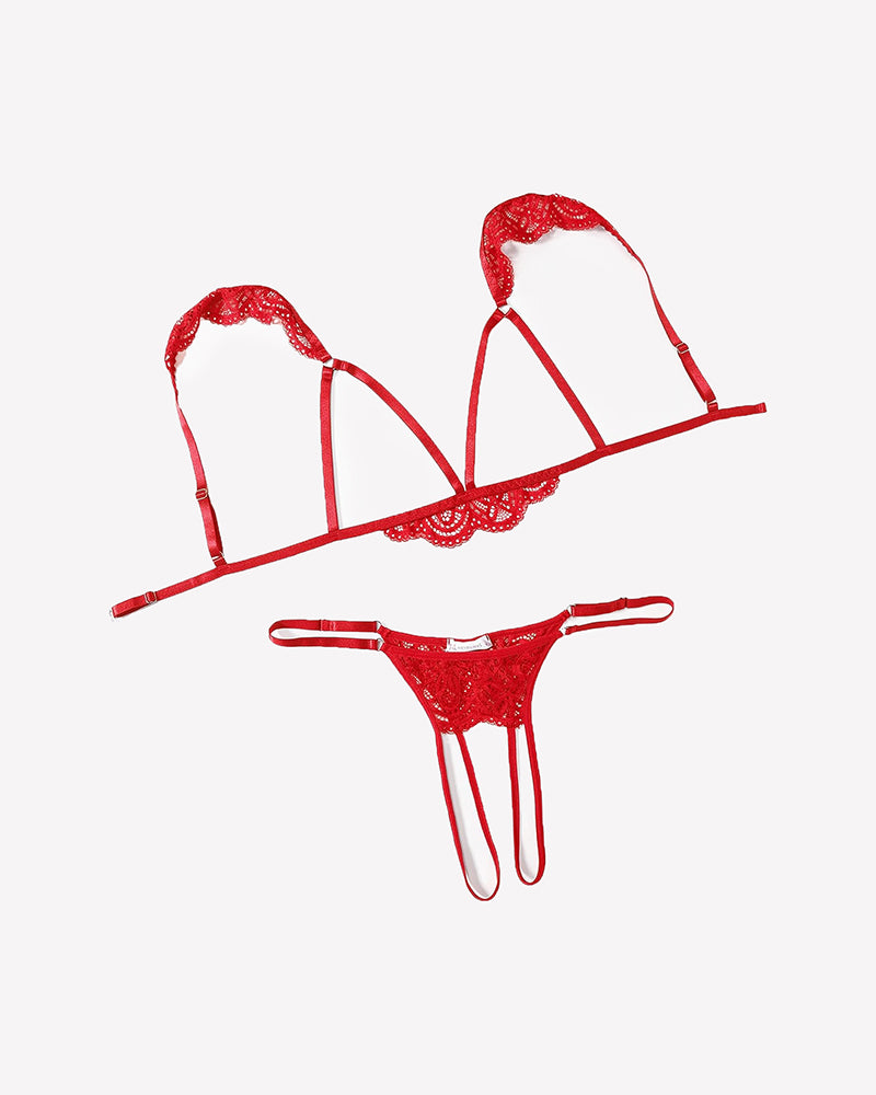 Red lace bra and thong set with triangular cups, scalloped edge, and dangling strap details.