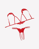 Red lace bra and thong set with triangular cups, scalloped edge, and dangling strap details.