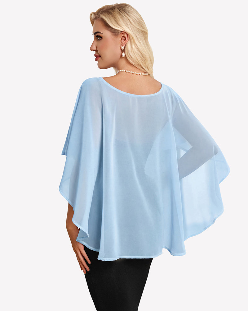 Light blue chiffon cape shawl with draped flutter sleeves over a black dress