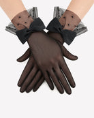 Black mesh short gloves with large satin bow and lace polka dot cuffs