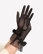 Black mesh long gloves with bowed dotted cuff and sheer fingerless style