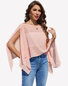 Light pink chiffon off-shoulder batwing blouse with flowing cape sleeves.