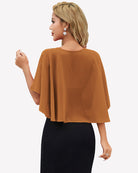 Orange-brown chiffon cape wrap bolero with back coverage and flutter sleeves over black dress