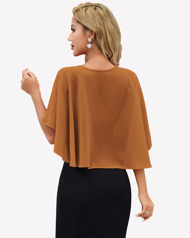Orange-brown chiffon cape wrap bolero with back coverage and flutter sleeves over black dress