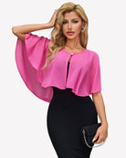 Pink chiffon cape wrap bolero with keyhole front and flutter sleeves over black dress