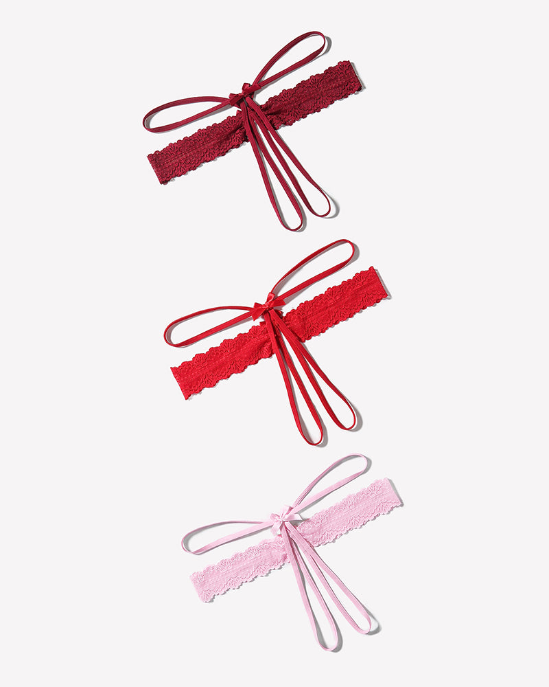 Lace hollow-out thong g-string underwear with bow ties, red and pink pair
