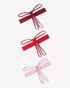 Lace hollow-out thong g-string underwear with bow ties, red and pink pair