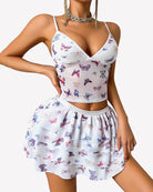 White butterfly print two-piece lounge set with V-neck cami top and tiered mini skirt
