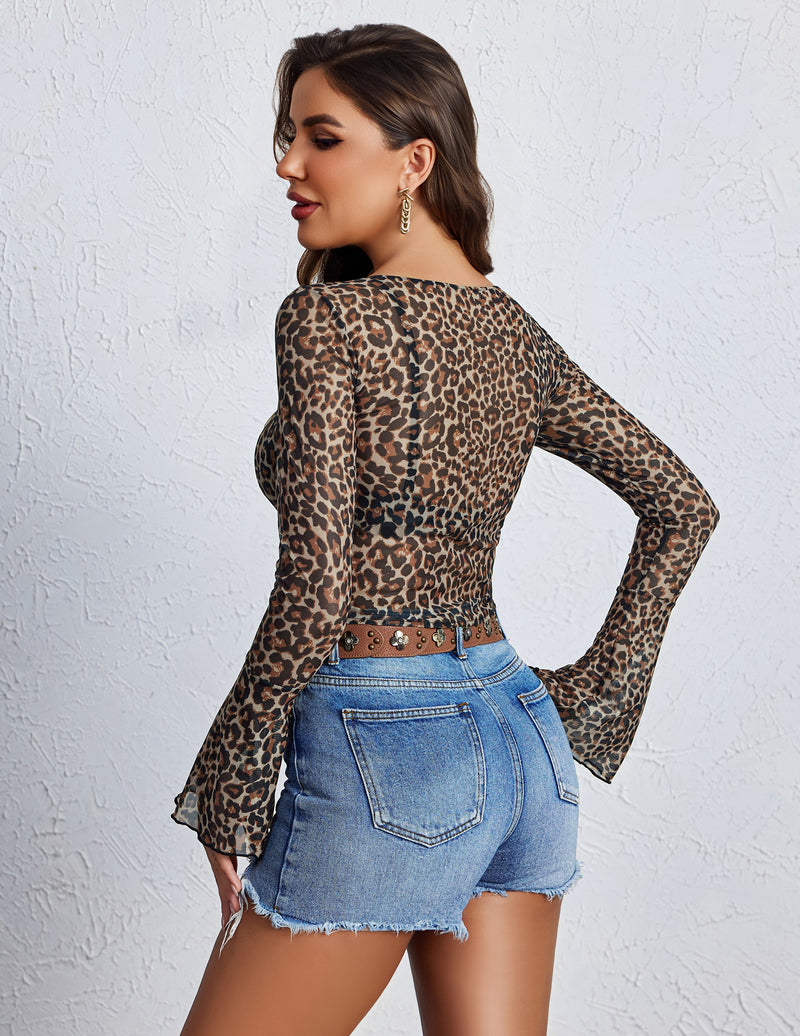 Back view of leopard print crop top with sheer mesh sleeves and flared cuffs