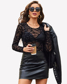 Black geometric sheer mesh long-sleeve crew-neck top, fitted slim silhouette.