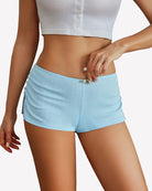 Light blue low-rise lounge shorts with ruched waistband and side slit