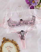 Embroidered underwire bra and panty set in lilac-pink lace with floral appliques
