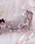 Lilac-pink embroidered underwire bra with floral lace trim and scalloped edges