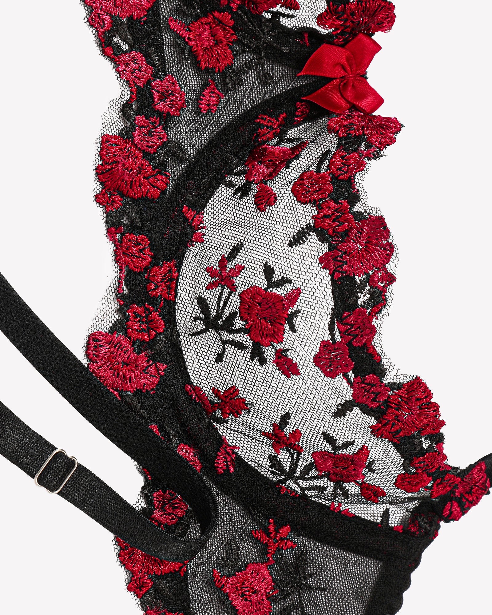 Embroidered sheer panty with black mesh and red floral lace, close-up