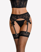 Black lace garter belt with bow garters, suspender straps, and fishnet stockings