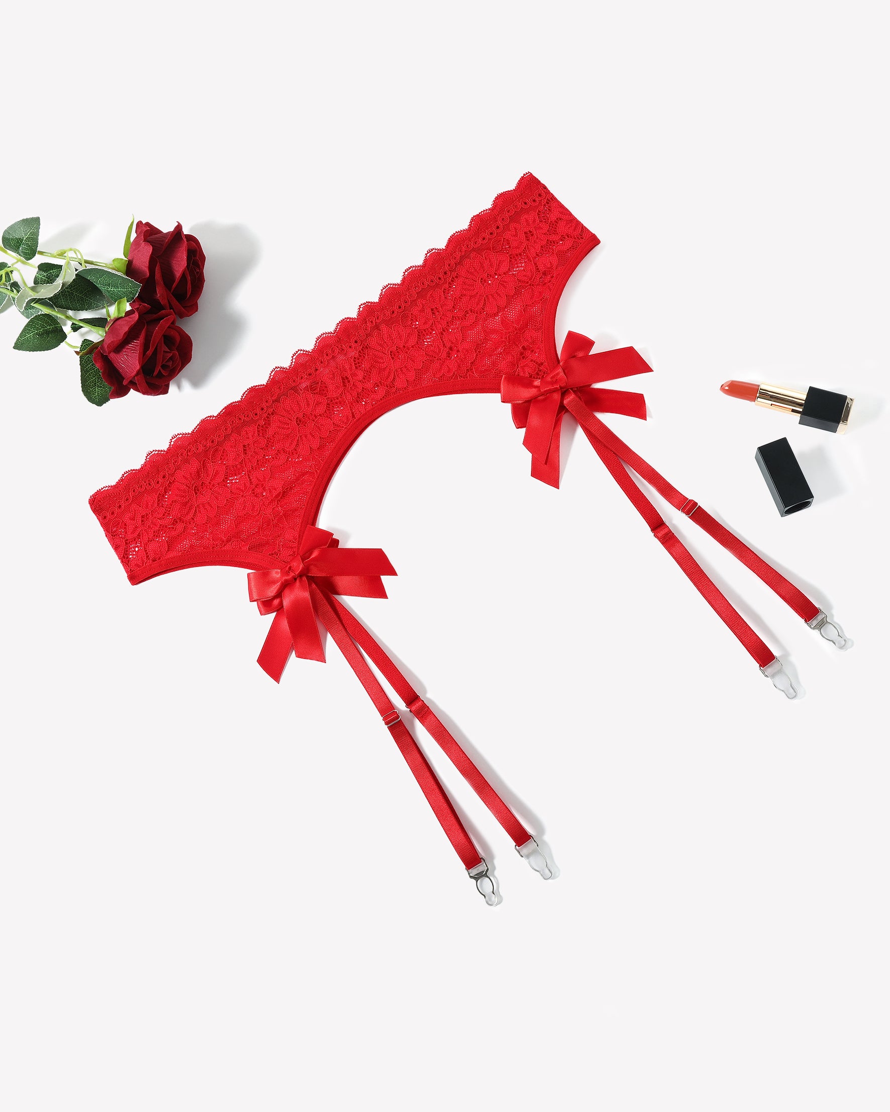 Carmine red lace garter belt with four adjustable suspender straps and bow ties