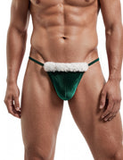 Men's velvet low-rise thong in green with white faux fur trim and thin straps