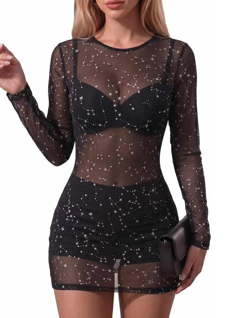 Black sheer mesh mini dress with long sleeves and star-speckled galaxy print