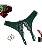 Green low-rise lace mesh thong with floral cutout lace and bow