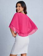 Fuchsia chiffon capelet shawl with tiered ruffle layers over a fitted white dress