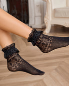 Black sheer ankle socks with lace ruffle top and dot-diamond pattern