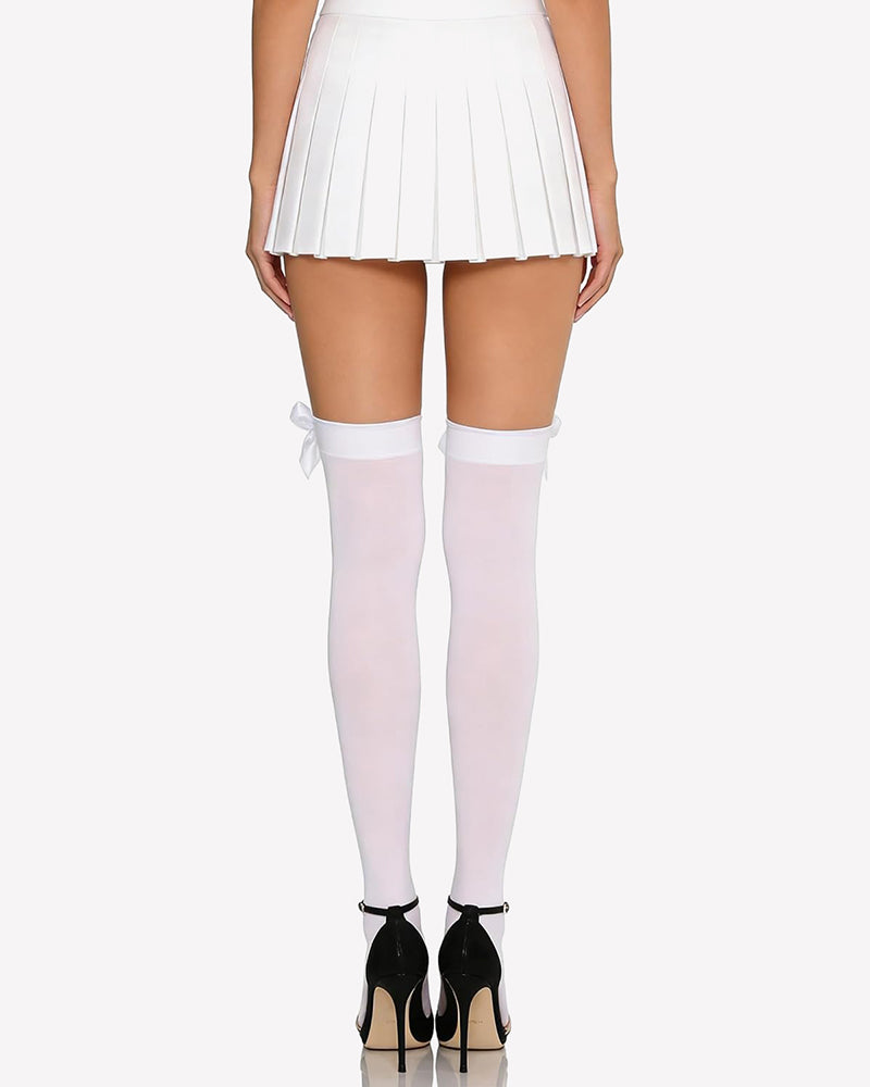 Pale pink satin thigh-high stockings with over-knee bow detail and smooth finish