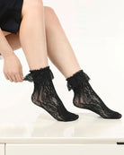 Black lace anklet socks with ruffle cuff, sheer lace pattern on foot and ankle